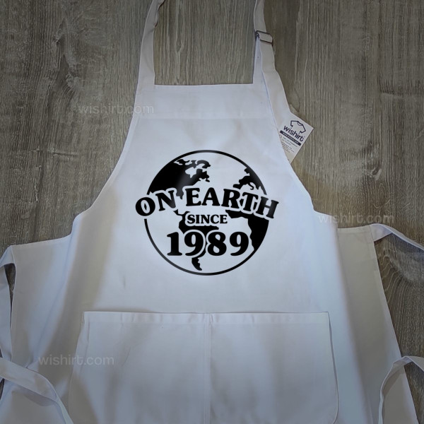 On Earth Since Customizable Year Apron